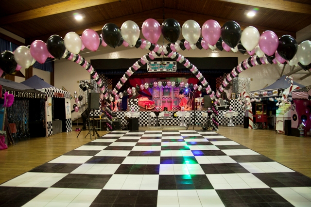 Helium inflated balloon arch suspended over the dance floor for a Grade 7 farewell at De Hoop Primary School