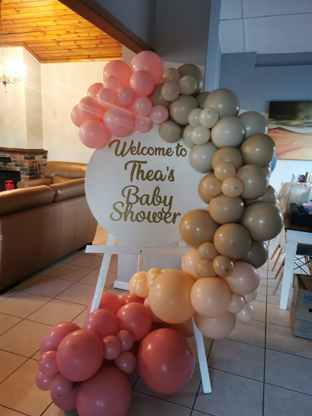 Personalised white welcome board for Thea’s baby shower, complimented by our beautiful pink and natural garland