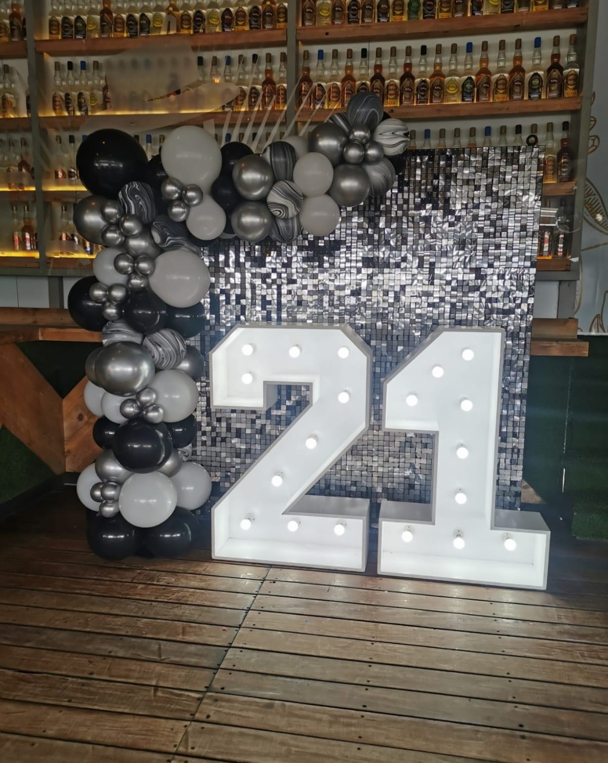 21st Birthday PArty done at Thirsty Scarecrow featuring our stunning Silver Shimmer backdrop and our 21 Marquee Numbers