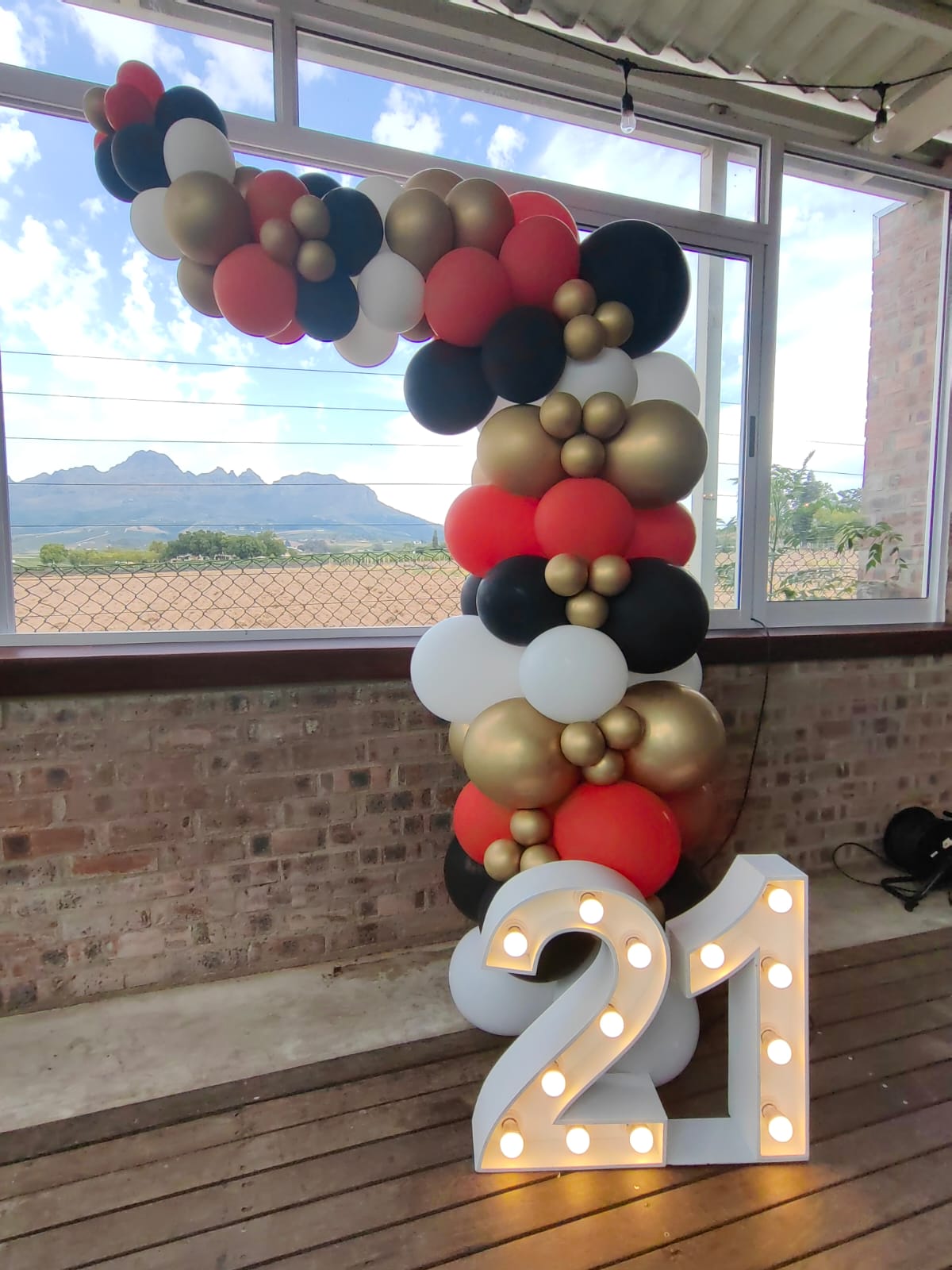 Balloon Garland and our 60cm Marquee Numbers beautifully displayed at Thirsty Scarecrow for a 21st Birthday Party