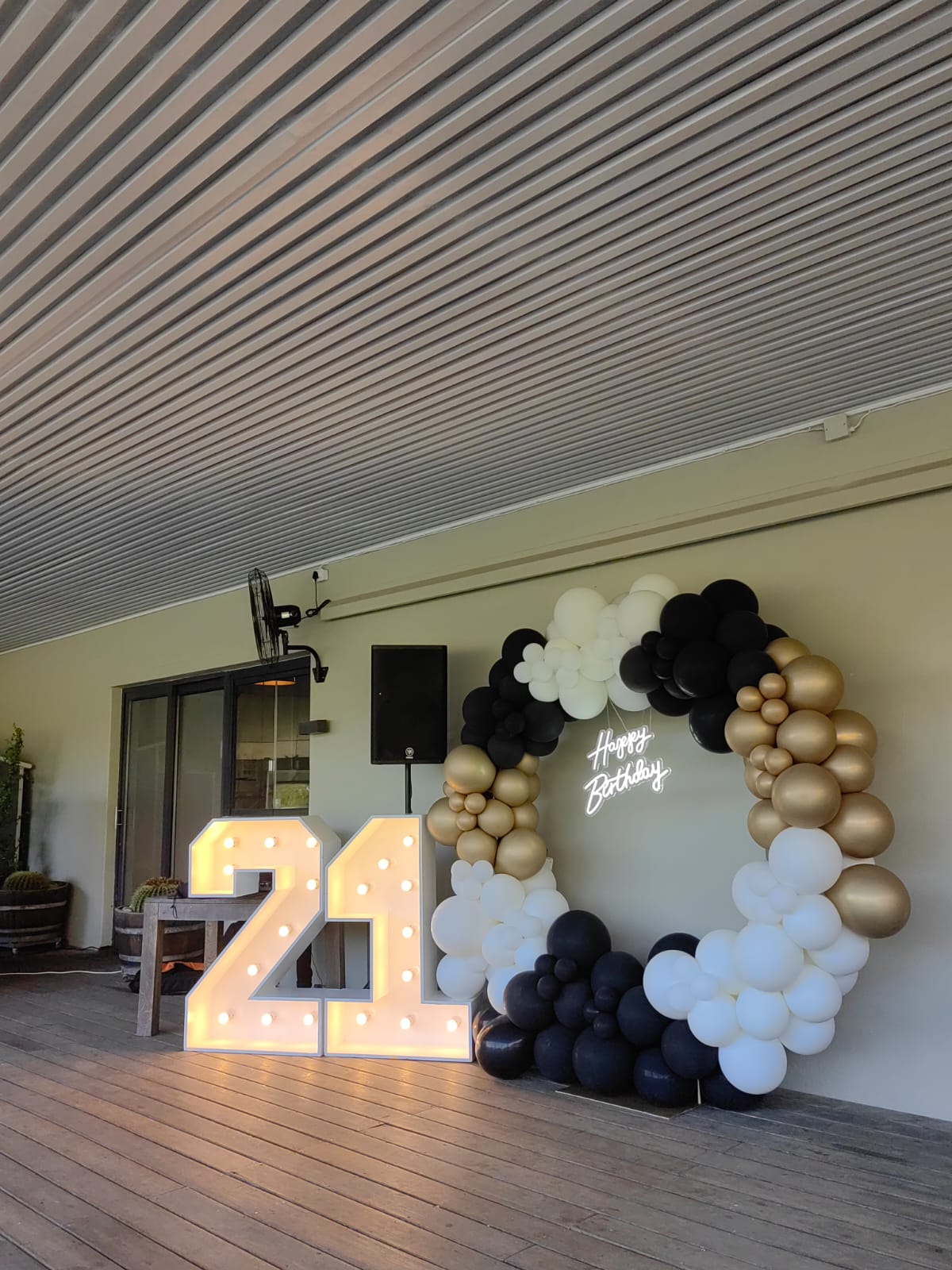 Circle balloon garland featuring our stunning 21 Marquee Numbers and our Happy Birthday LED sign